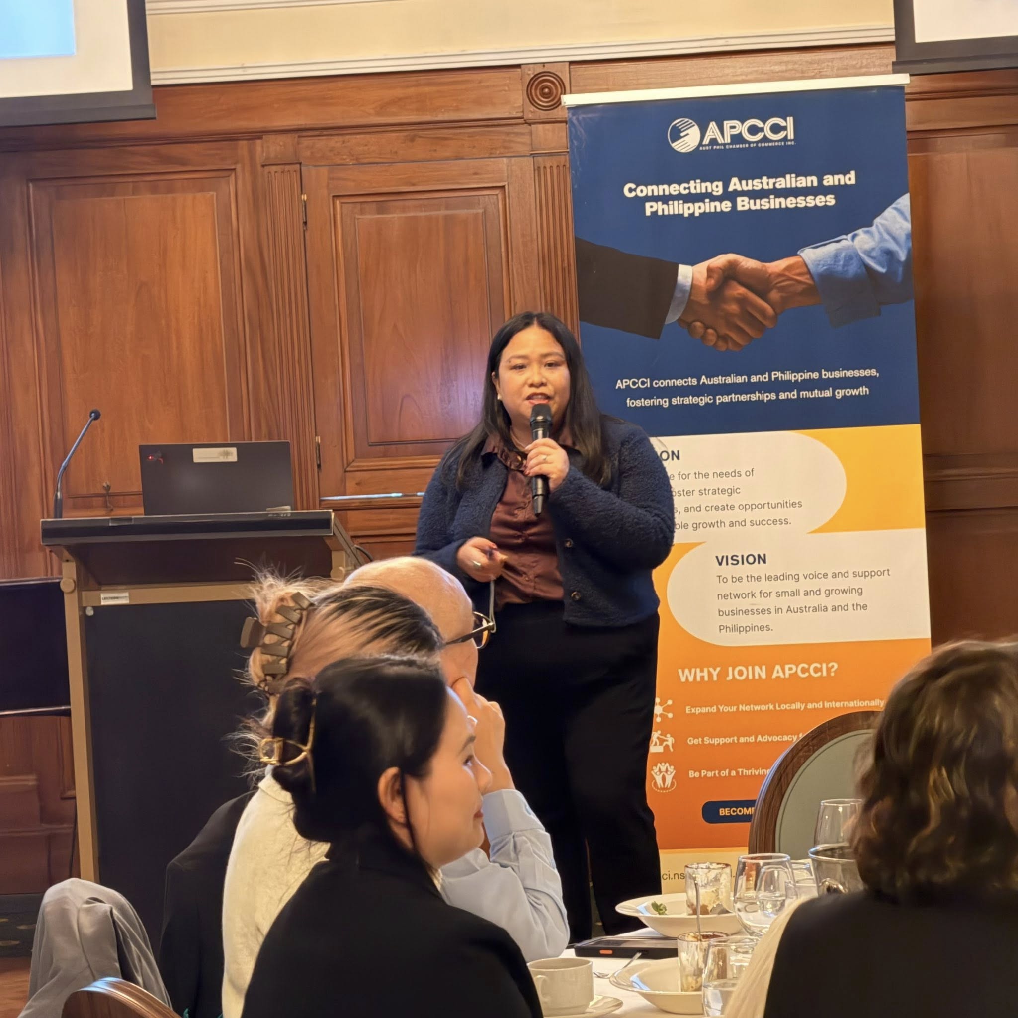 Aust-Phil Trade and Tourism Review and APCCI Officers Induction Night — 29 May 2026 (Speaker with APCCI mission banner)