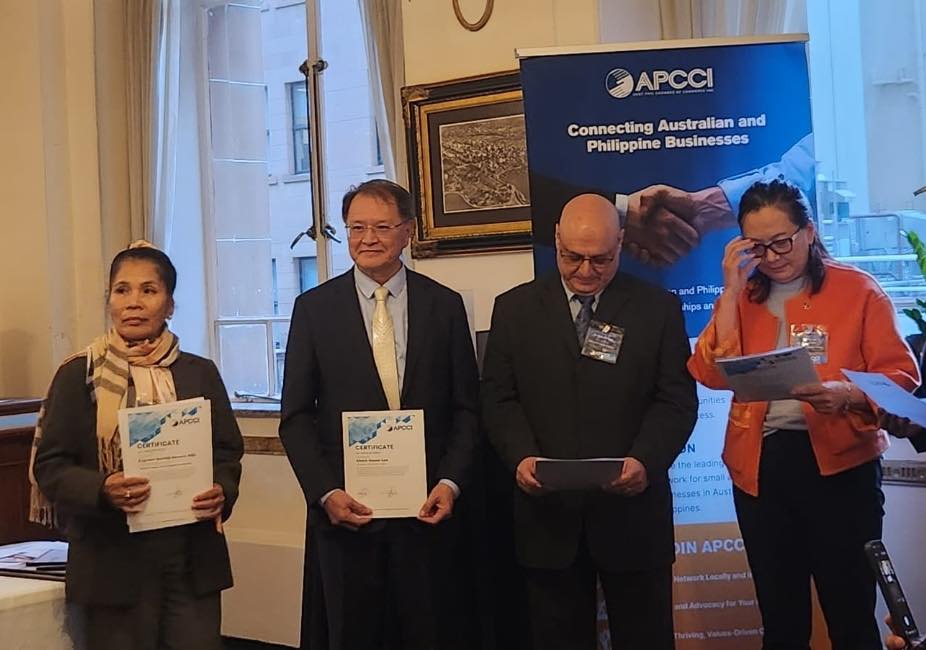 Aust-Phil Trade and Tourism Review and APCCI Officers Induction Night — 29 May 2026 (Certificate presentation with APCCI banner)